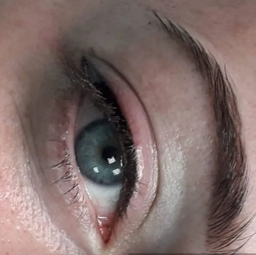 eye lash tattoo